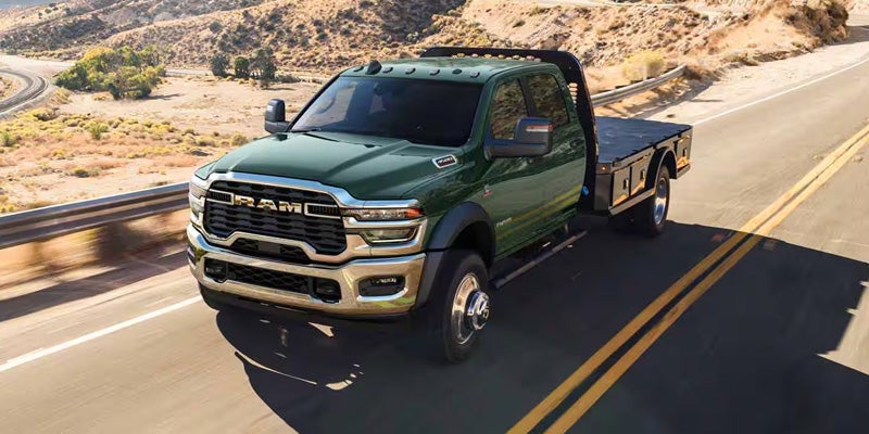 Front side view of Ram Chassis Cab truck on road